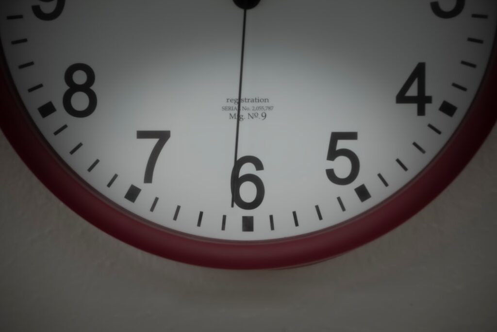 a close up of a clock face showing the time