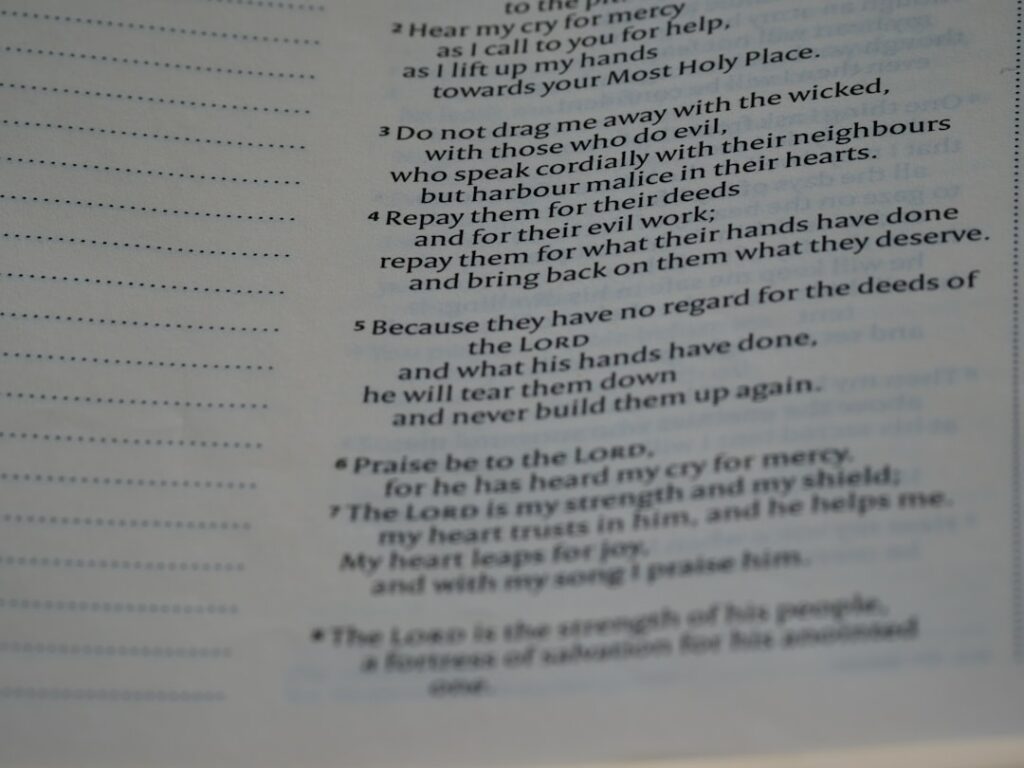 a close up of a book with a poem on it